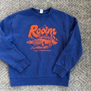 “Roam the Unknown” Blue Sweater with Orange Graphic
